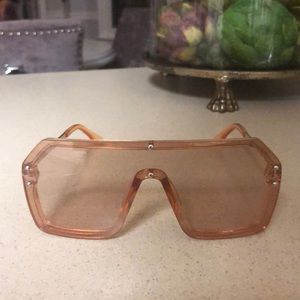 Cute peach shield sunglasses. Sturdy! No brand